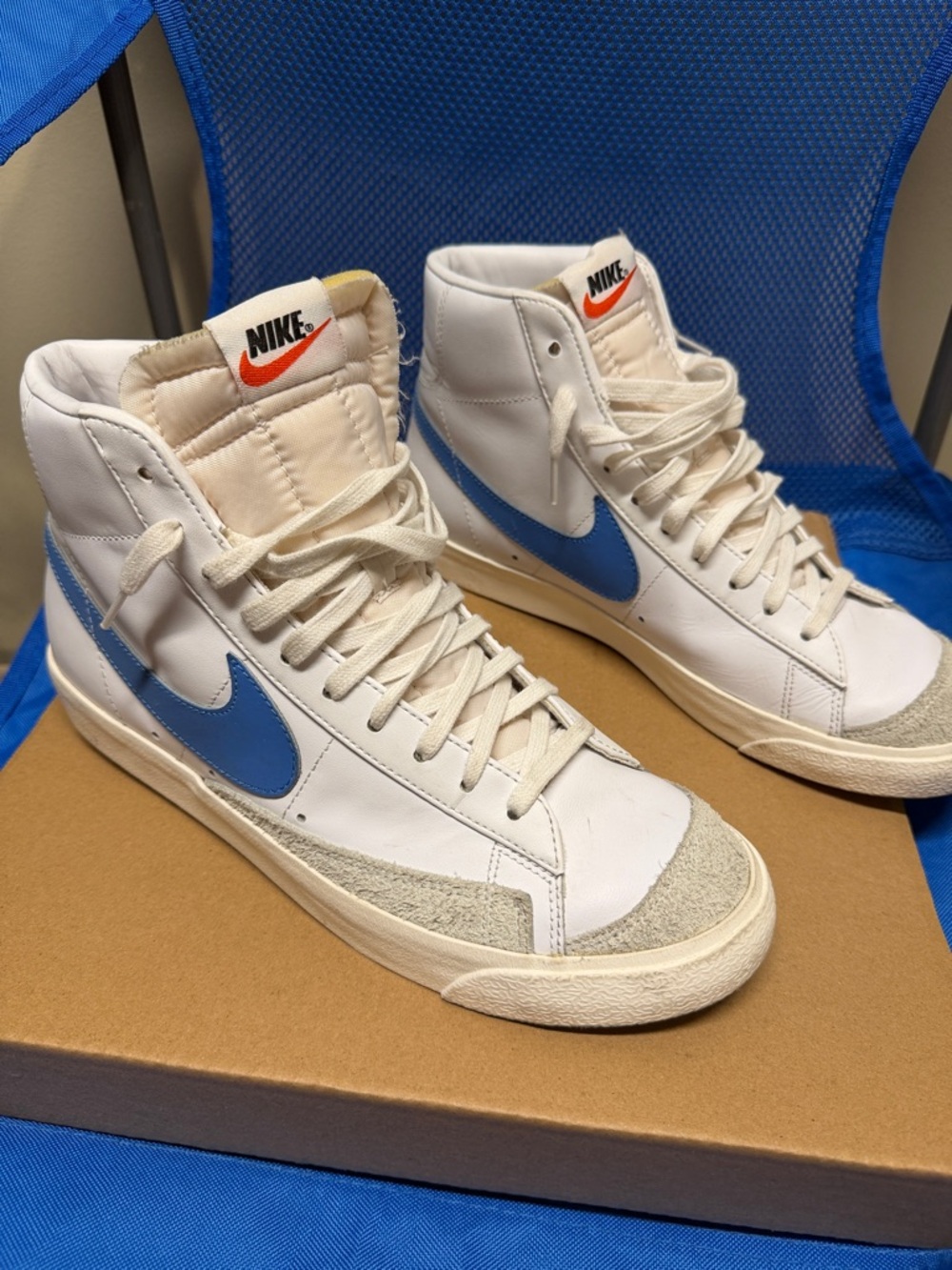 Nike Men’s White and Blue High-Top Sneakers with Orange Logo